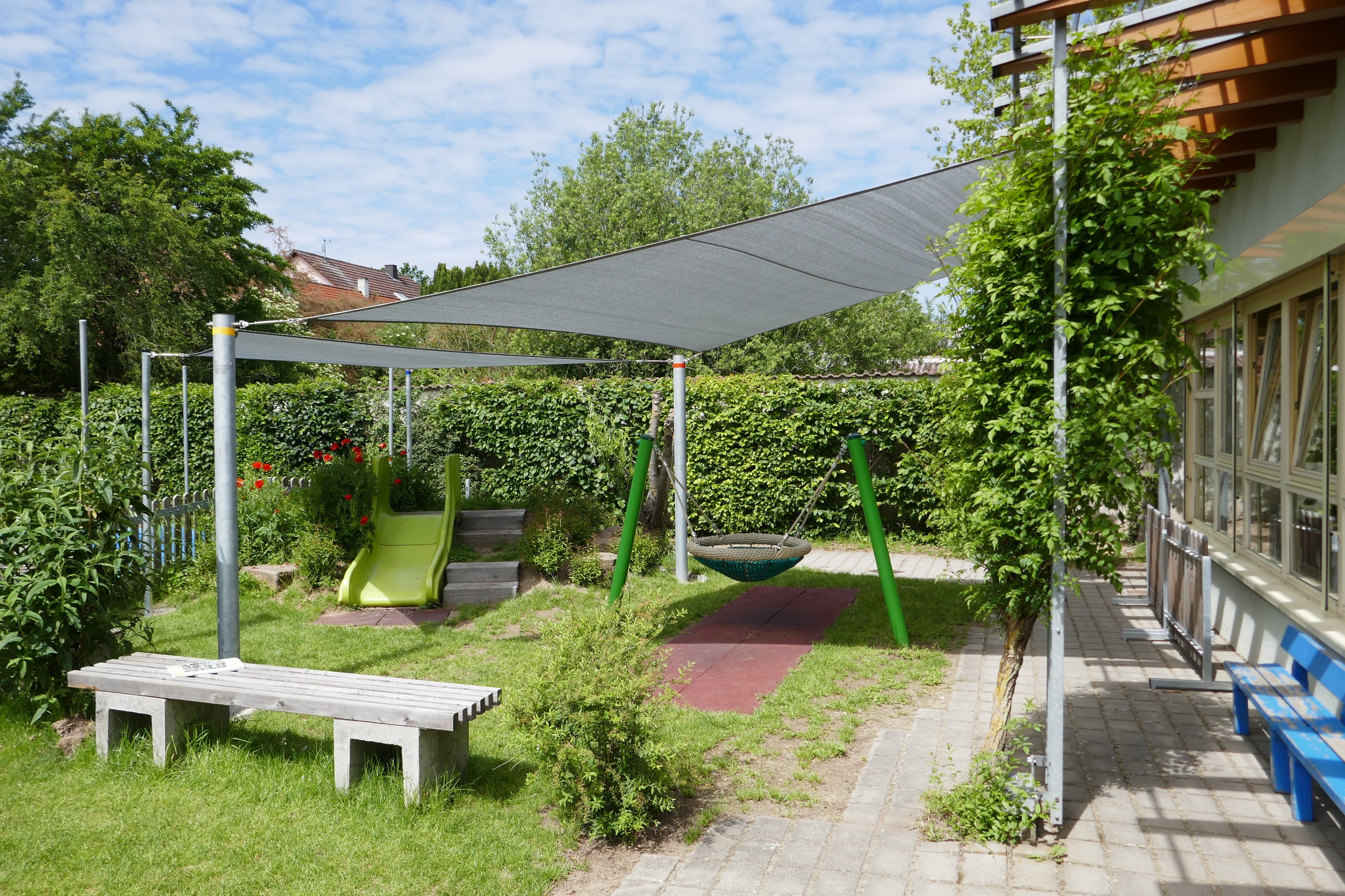 Modernes Sonnensegel als Terrassenüberdachung für effektiven UV-Schutz – Planen Wehner GmbH.